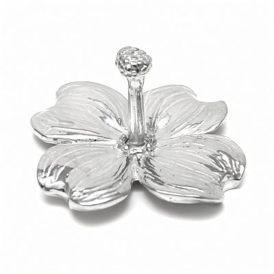 Dogwood flower ring holder in solid pewter on a white background