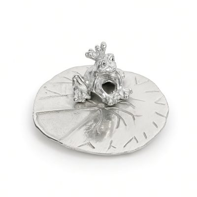 Crowned frog prince ring holder in solid pewter on a lily pad dish, white background