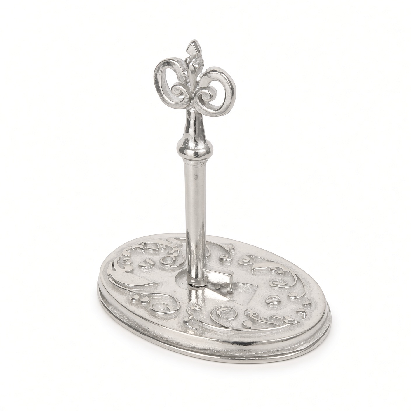 Victorian key and lock ring holder in solid pewter, an ornate skeleton key standing in an oval scrolled base, white background
