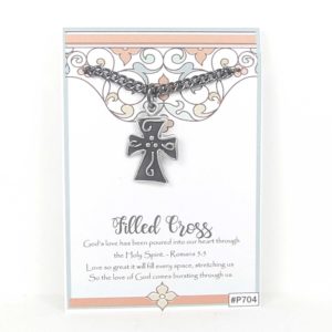 Antique pewter filled cross necklace shown on story card