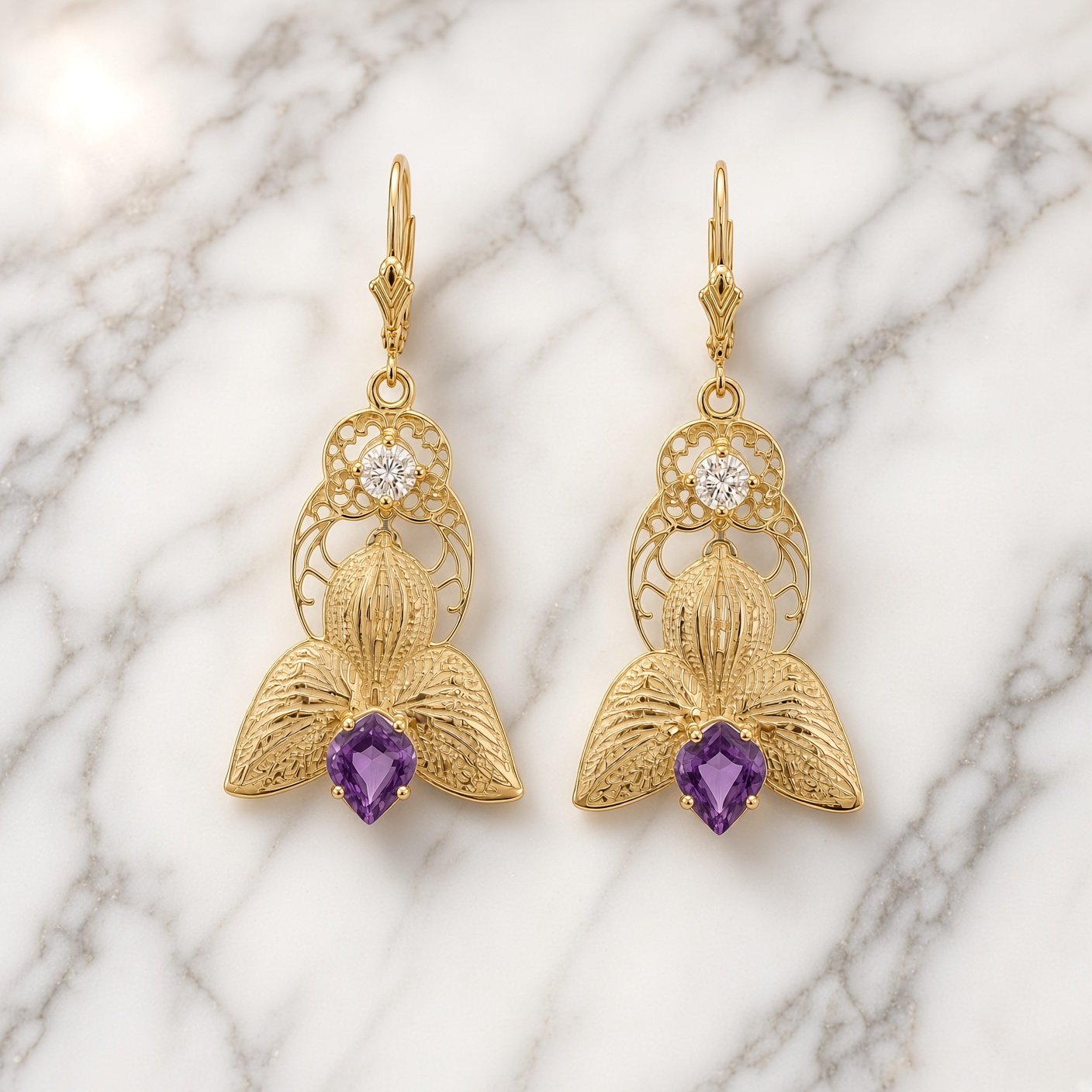 14K yellow gold orchid earrings with purple amethysts and diamonds on white and gray marble