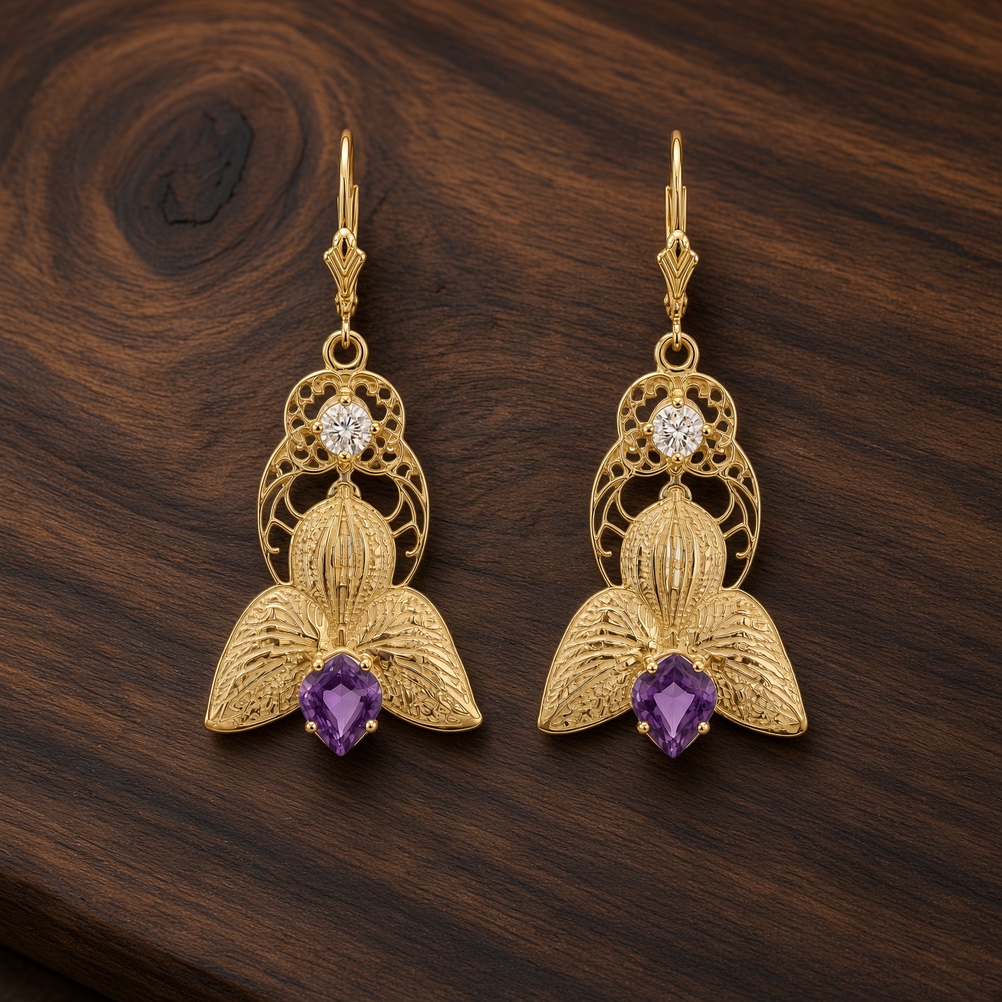 Art nouveau orchid earrings in 14K gold with amethysts and diamonds on dark wood