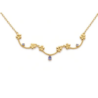 14K yellow gold collar necklace of forget-me-not flowers in three beaded links with tanzanites, white background