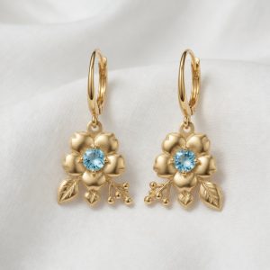 Please take this photo and enhance the details , change the background to cream fabric. Keep the jewelry design and all proportions the same.