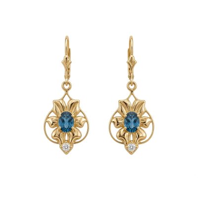 Nouveau Flower Earrings in 14K yellow gold with oval London blue topaz and diamond drops on fleur lever backs, on a white background