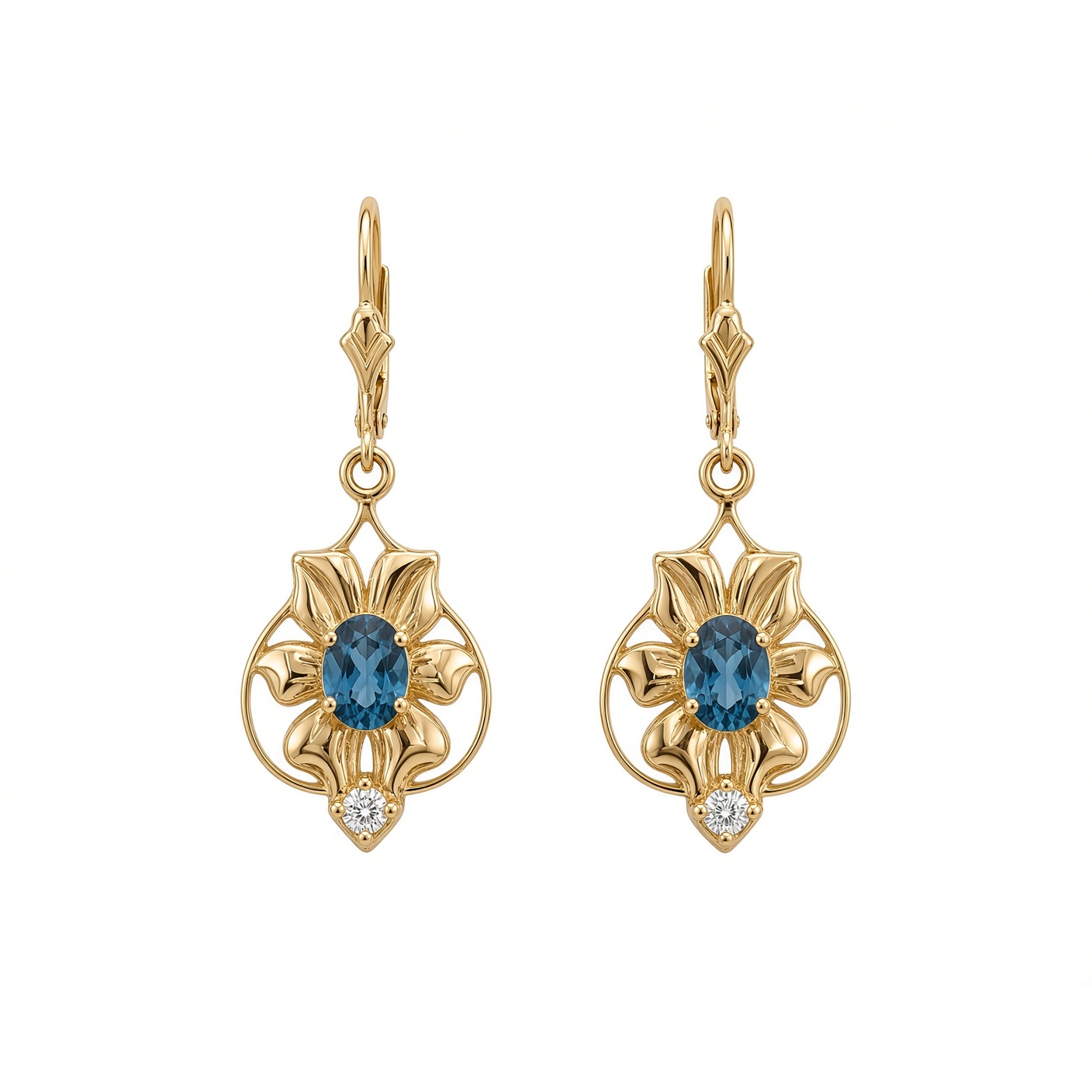Nouveau Flower Earrings in 14K yellow gold with oval London blue topaz and diamond drops on fleur lever backs, on a white background