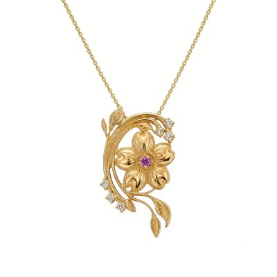 14K yellow gold cherry blossom pendant with a pink sapphire center and diamonds on a gold chain, white background